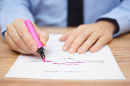 businessman is underlining important text in contractの写真素材