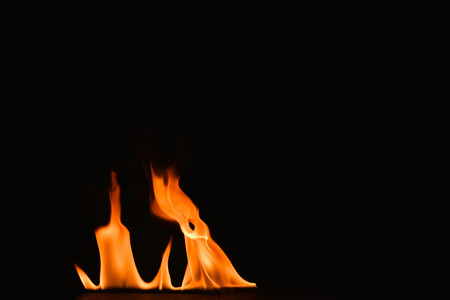 Abstract fire flames on a black background.の写真素材