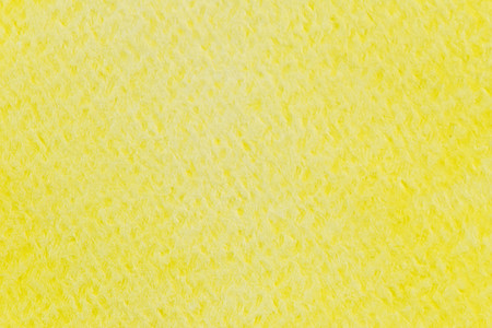 Abstract yellow watercolor painting textured on white paper backgroundの写真素材