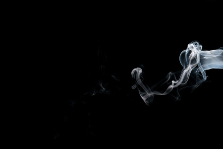 Smoke isolated on black backgroundの写真素材