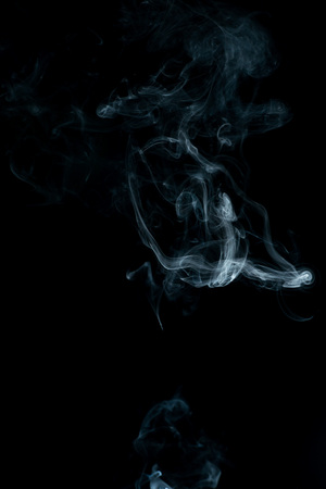 Smoke isolated on black backgroundの写真素材
