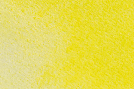 Abstract yellow watercolor painting textured on white paper backgroundの写真素材