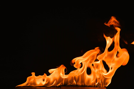 Abstract fire flames on a black background.