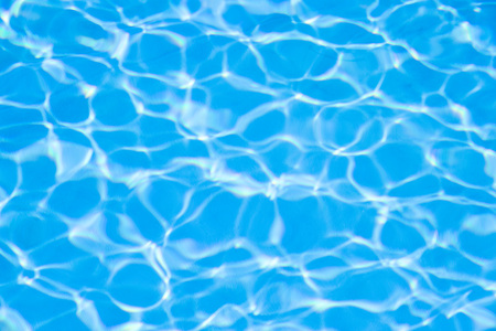 Water in swimming pool blue backgroundの写真素材