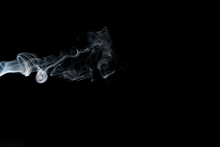Smoke isolated on black backgroundの写真素材