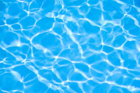 Water in swimming pool blue backgroundの写真素材