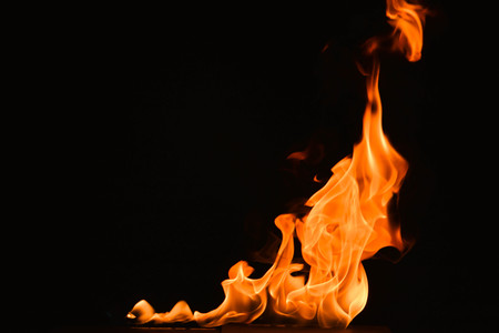 Abstract fire flames on a black background.