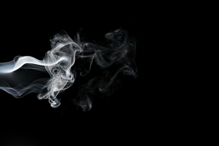 Smoke isolated on black backgroundの写真素材
