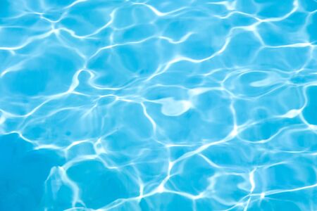 Blue water in swimming pool backgroundの写真素材