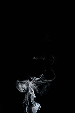 Smoke isolated on black backgroundの写真素材