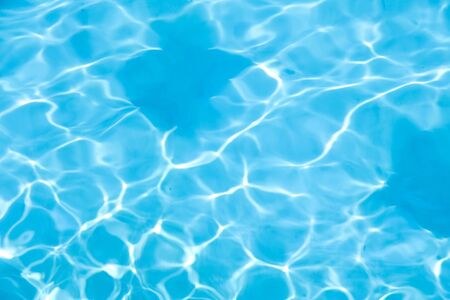 Blue water in swimming pool backgroundの写真素材