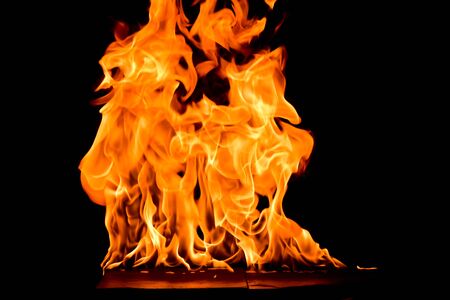 Fire flames abstract on black background.の写真素材