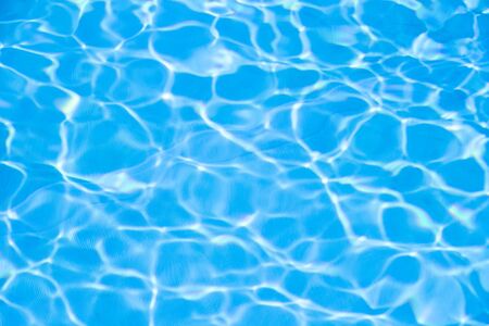 Water in swimming pool blue backgroundの写真素材