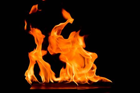 Fire flames abstract on black background.の写真素材
