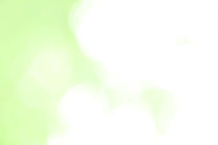 Green bokeh abstract background out of focus from nature forestの写真素材