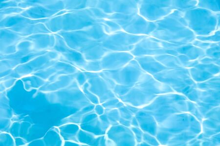 Blue water in swimming pool backgroundの写真素材