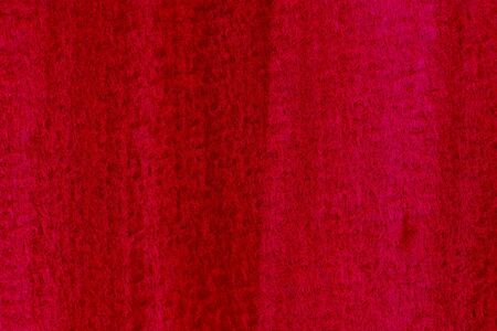 Red watercolour texture on paper backgroundの写真素材