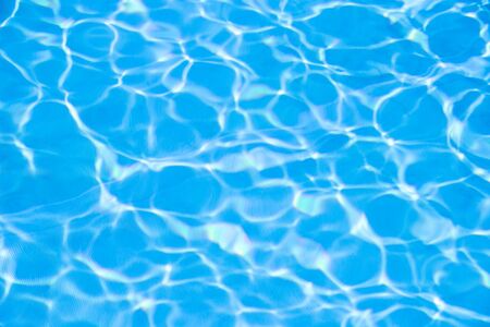Water in swimming pool blue backgroundの写真素材