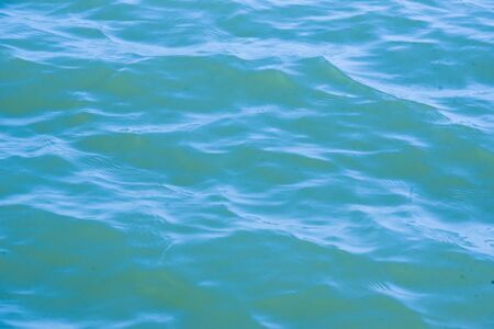 Blue water sea wave texture backgroundの写真素材