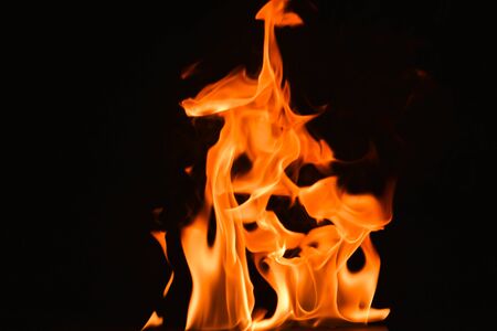 Abstract fire flames on a black background.の写真素材
