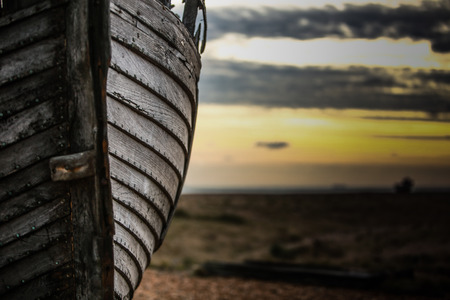 A deserted old fishing boatの写真素材