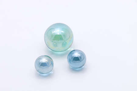 Transparent Glass Marbles on White Backgroundの写真素材