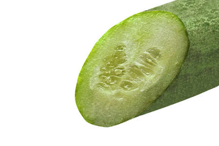 Closeup Cucumber Slice Off Isolated on White Backgroundの写真素材