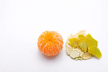 Green Mandarin Orange with Orange Peel on White Backgroundの写真素材