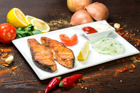 feesh brisket on skewers barbecue brazier grid full burned charcoalの写真素材