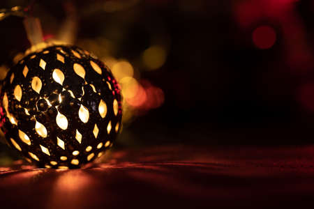 Holiday Christmas bell light with bokehの写真素材
