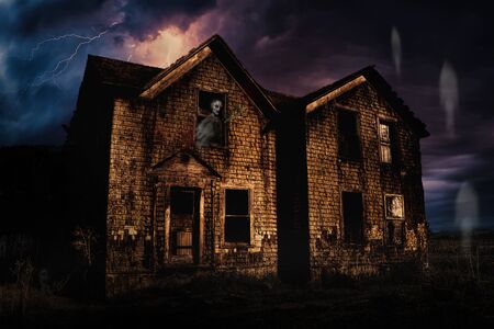 Haunted House with Lightning and Ghosts, Color Imageの写真素材