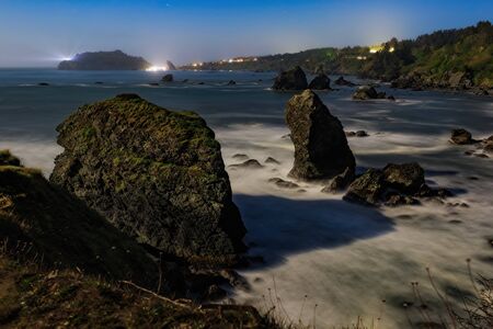 Moonlit Night Image of a Rocky Beach, Northern California Coastの写真素材