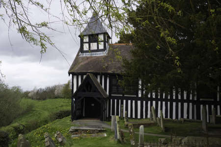 Melverley Church in Shropshire under a cloudy skyの写真素材