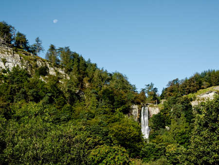 Overview of Pistyl Rhaeadr Waterfall near Llanrhaeadr in Walesの写真素材