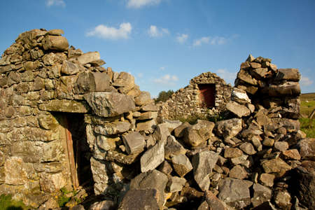 Dry stone wall farm building in ruinsの写真素材
