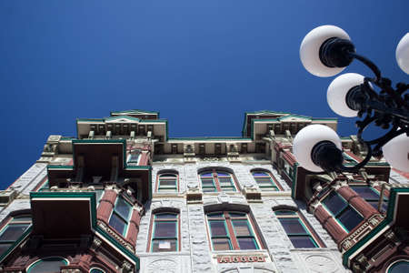 Gaslamp district of San Diego with the old Louis Bank of Commerce building set by ornate gas lampsの写真素材