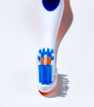 Macro image of toothbrush head with sharp bristles and out of focus handleの写真素材