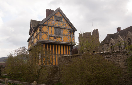 Gatehouse entrance to Stokesay castle on a dark cloudy dayのeditorial素材