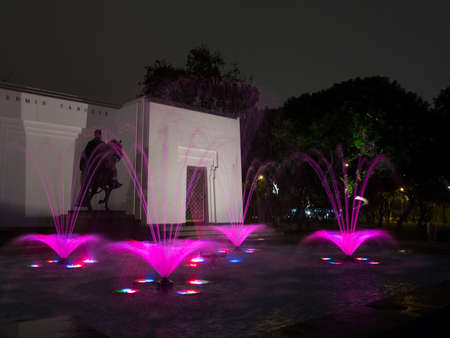 Illuminated fountains at dusk in Magical Water Circuit in Reserve Park, Lima, Peru world record for largest fountainsの写真素材