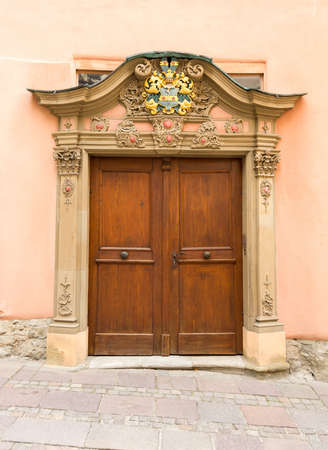 Pair of old wooden doors on old house in Schwabisch Hall in Southern Germanyの写真素材