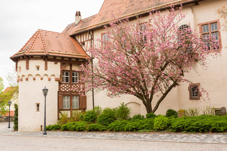 Kurmainz Castle with Turmersturm tower and Tauber Franconian Museum of Rural life in ancient town of Tauberbischofsheim in Germanyのeditorial素材
