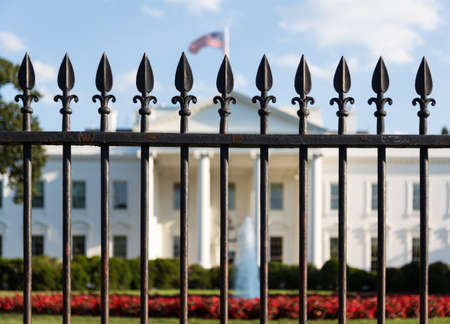 Main entrance of White House seen through railings at 1600 Pennsylvania Avenue Washington DCの写真素材