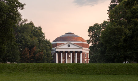 CHARLOTTESVILLE, VA - AUGUST 28: Dawn sky over Rotunda on campus of University of Virginia UVA on August 28, 2013. Designed by Thomas Jefferson as an Academical Villageのeditorial素材