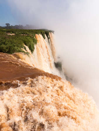 Flood swollen river leading to famous Iguassu Falls on border between Brazil and Argentinaの写真素材