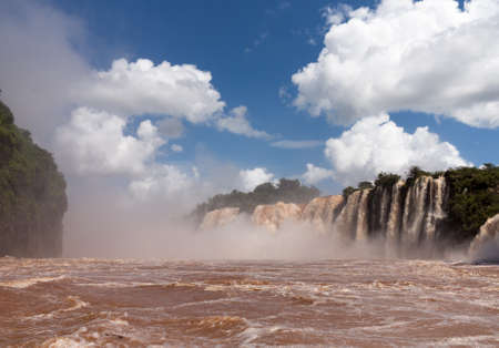 Flood swollen river leading to famous Iguassu Falls on border between Brazil and Argentinaの写真素材
