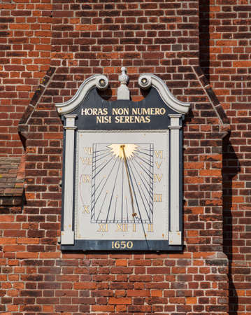 Ancient town clock on Moot Hall in Suffolk town of Aldeburgh on East Anglian coastの写真素材