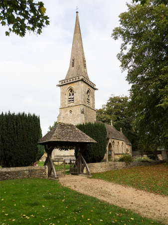 Parish Church in Lower Slaughter in Cotswold or Cotswolds district of southern England in the autumn.の写真素材