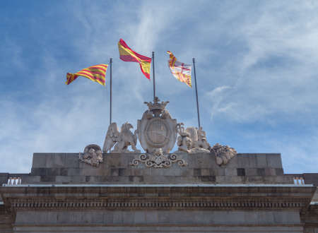 Flags flying on top of the Town Hall or Casa de la Ciutat in Barcelona Spainの写真素材