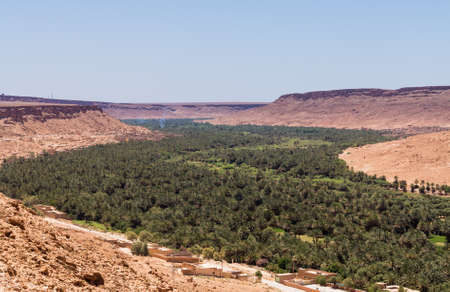 Aoufous in Morocco is a town set in the dry desert in the midst of a green oasis like riverの写真素材