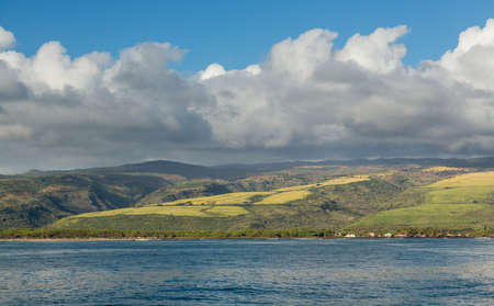 View from the ocean to the Grand Canyon of the Pacific or Waimea Canyon island of Kauai in the Hawaiian islandsの写真素材